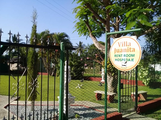 'Entrance and Sign from Outside' Casas particulares are an alternative to hotels in Cuba.